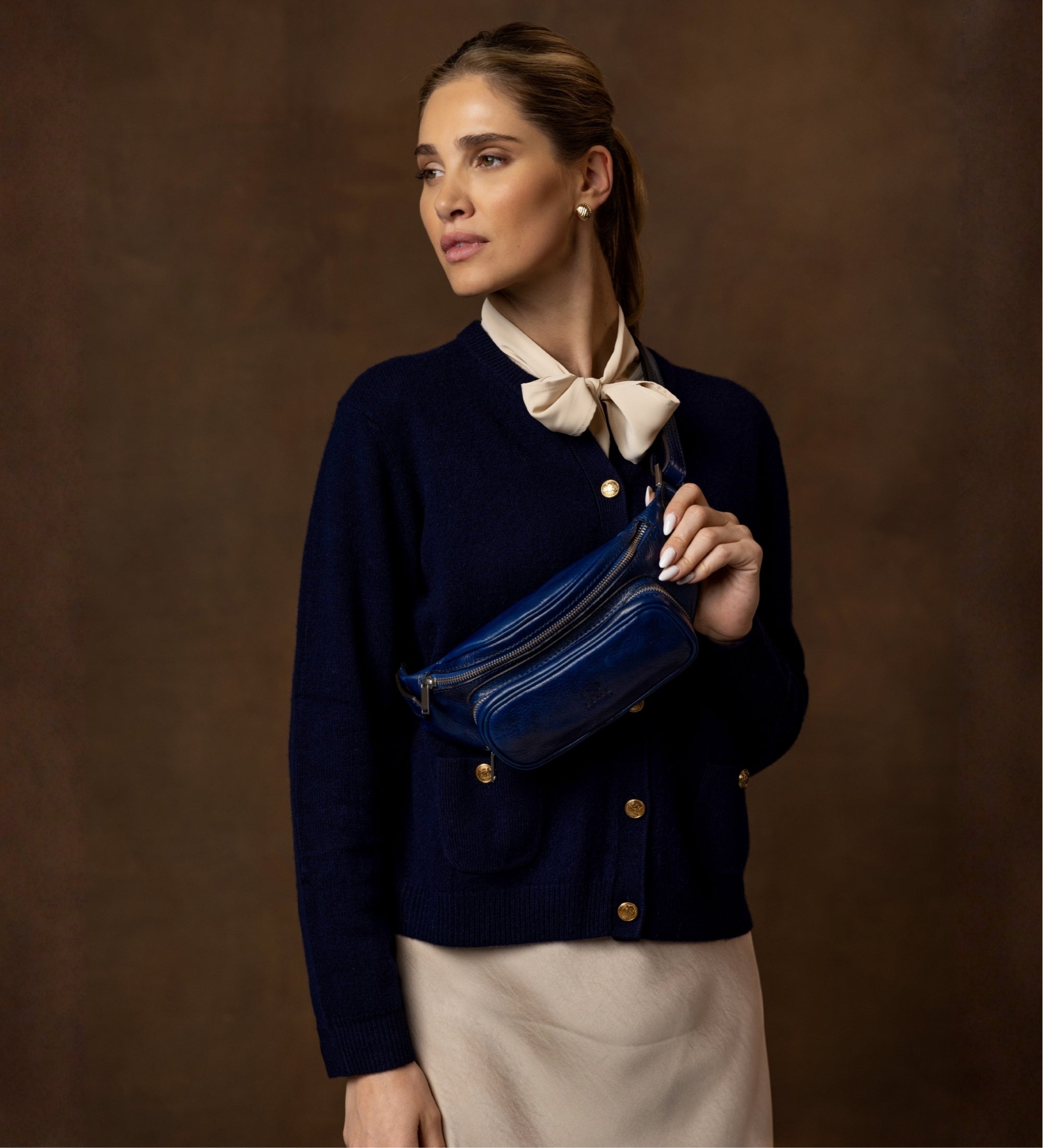 Riñonera/sling bag de cuero para mujer: Independent People