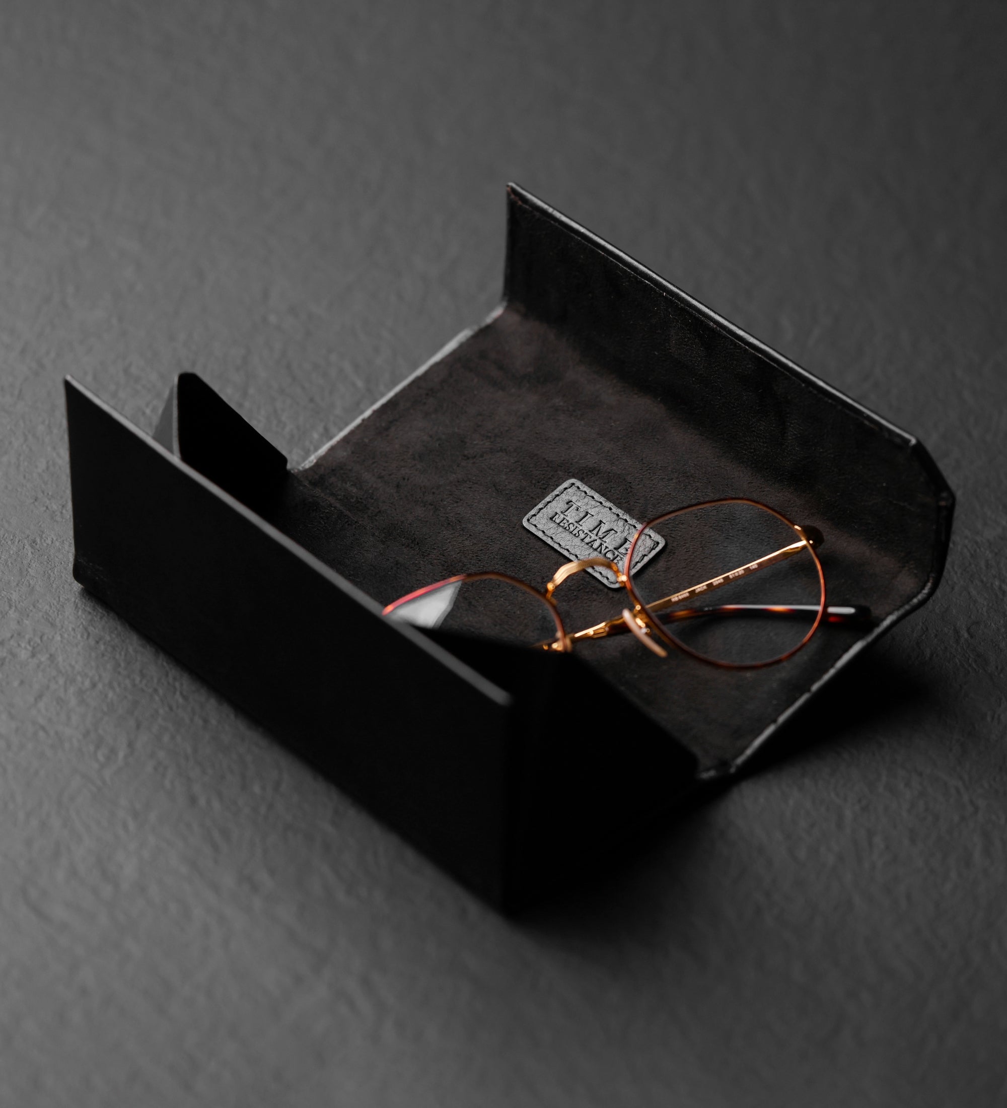 Estuche de cuero plegable para gafas: The Riddle of the Sands