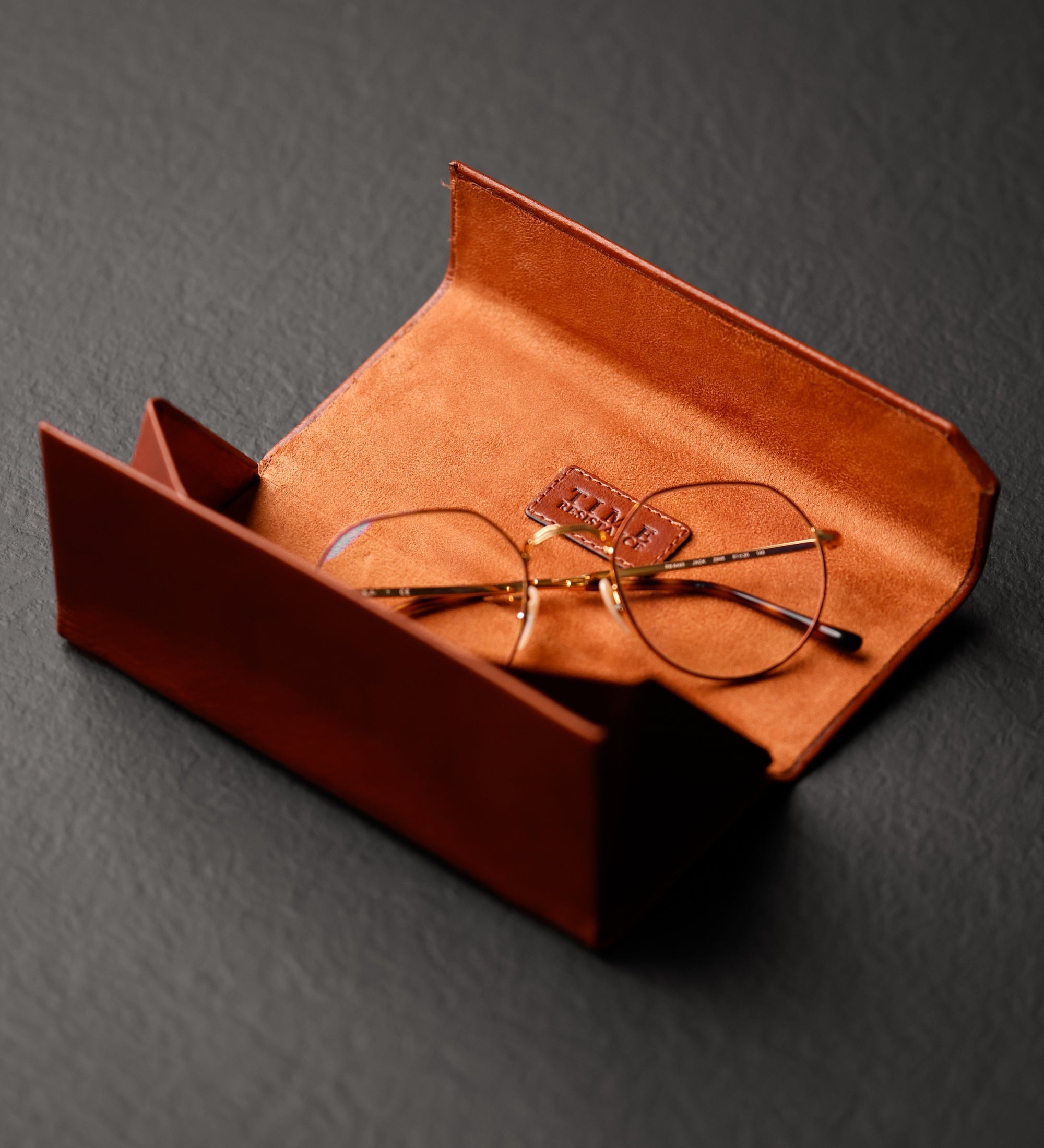 Estuche de cuero plegable para gafas: The Riddle of the Sands