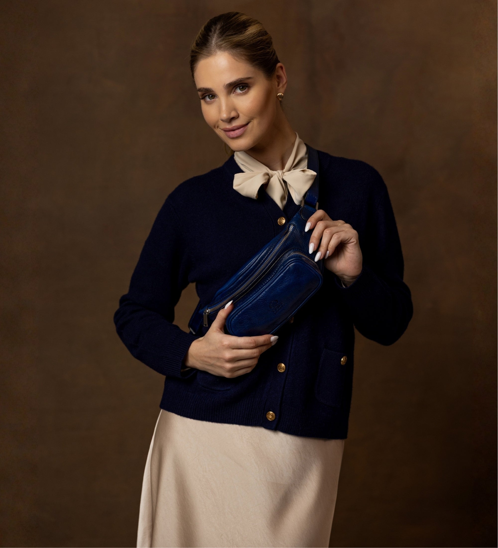Riñonera/sling bag de cuero para mujer: Independent People